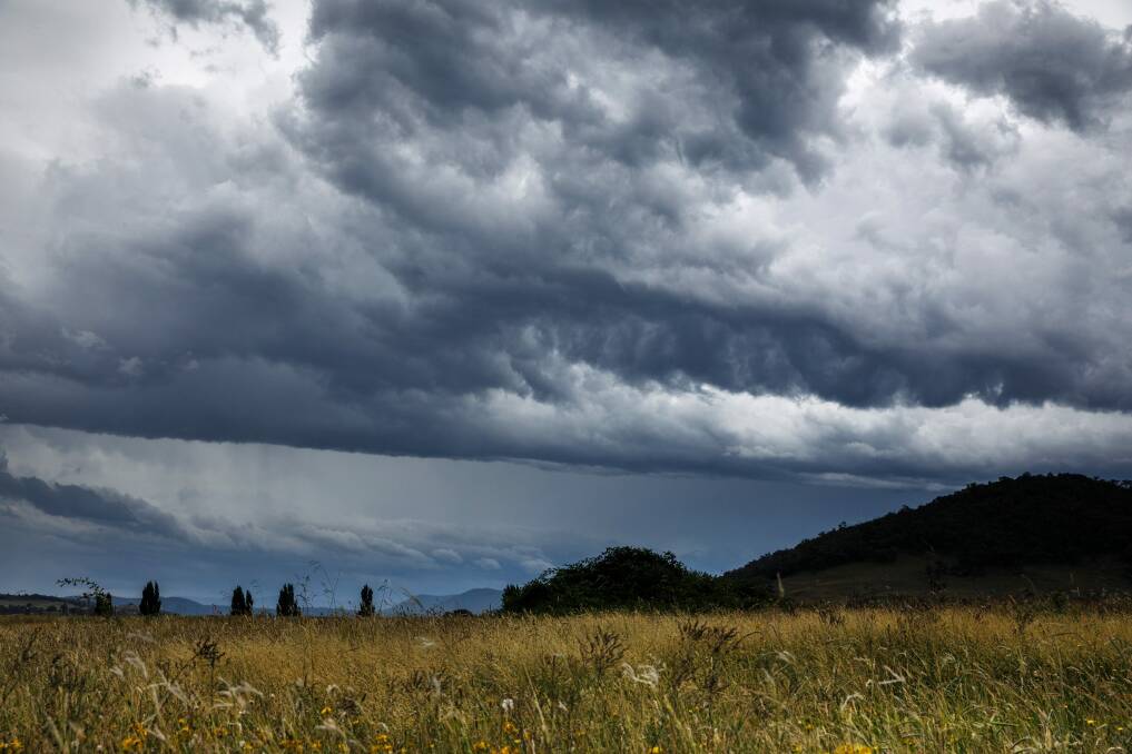 Storm clouds make their way over Uriarra.  Photo: Sitthixay Ditthavong