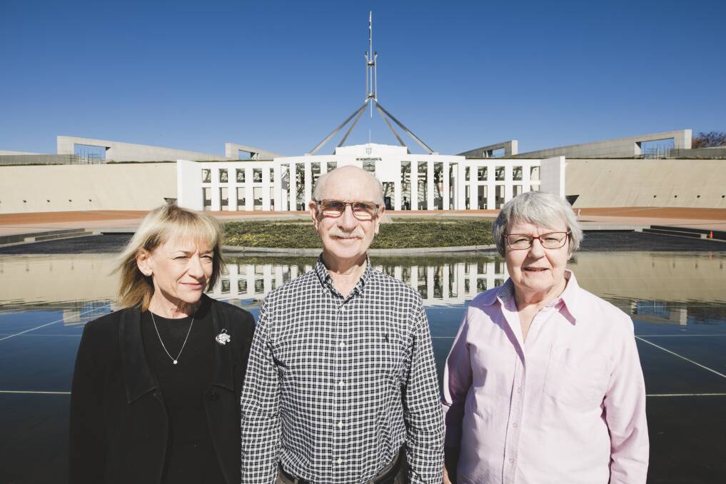 Marilyn Harrington, Rob Lundie and  Janet Wilson have all worked at Parliament House since it opened in 1988. Photo: Jamila Toderas