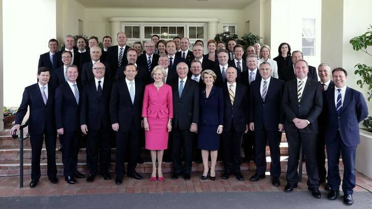 Governor-General Quentin Bryce poses for photos with Prime Minister Tony Abbott and his new ministry after the swearing-in ceremony at Government House. Photo: Alex Ellinghausen