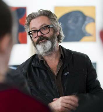 After ... Paul McDermott speaks to ANU school of Art students at his exhibtion, 'The Dark Garden', at M16 Artspace in Griffith. Photo: Rohan Thomson