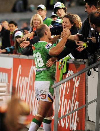Raiders player Terry Campese hugs his mum after his return from injury. Photo: Katherine Griffiths