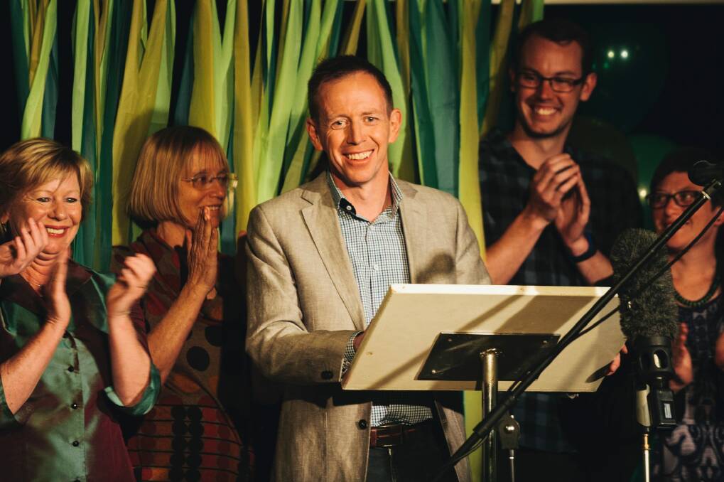 Shane Rattenbury, with Caroline Le Couteur, left, speaks at the Greens election party. Photo: Rohan Thomson