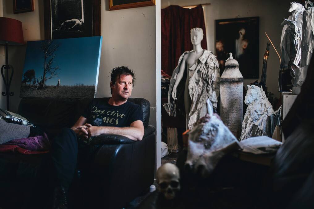 Canberra artist Stephen Harrison at home with some of his work. Photo: Rohan Thomson