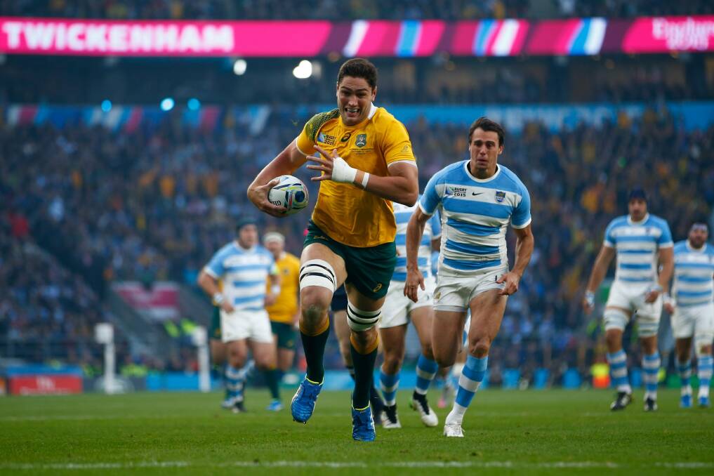 Opening try: Rob Simmons races through to score. Photo: Getty Images