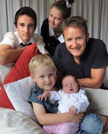 ABC radio breakfast announcer Ross Solly with his family. Photo: Graham Tidy