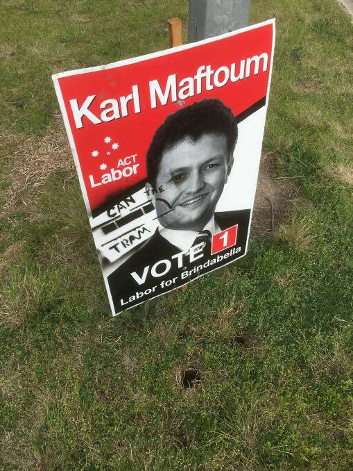 A sign for Labor candidate Karl Maftoum, which was defaced along Drakeford Drive on Thursday. Photo: supplied