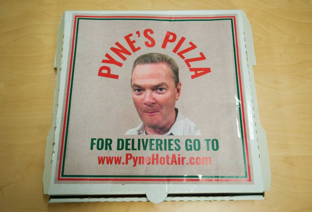 Minister for Industry Christopher Pyne's face on an an empty pizza box. Photo: Elesa Kurtz