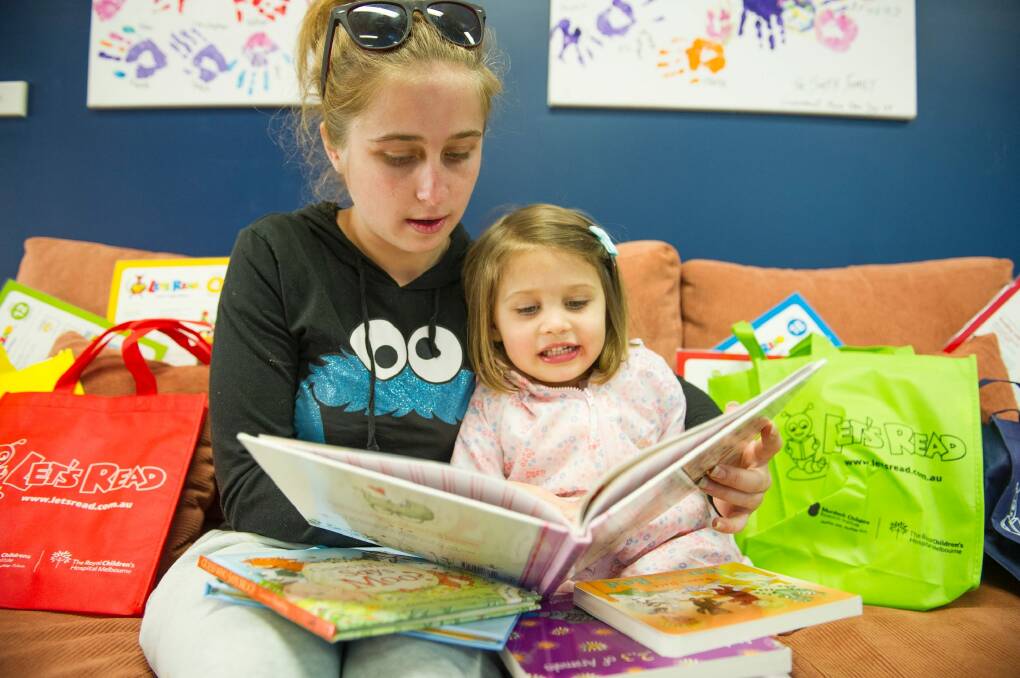 Naomi Thorn and daughter Mylee, 3 have participated in the Let's Read program for the last three months. Photo: Jay Cronan