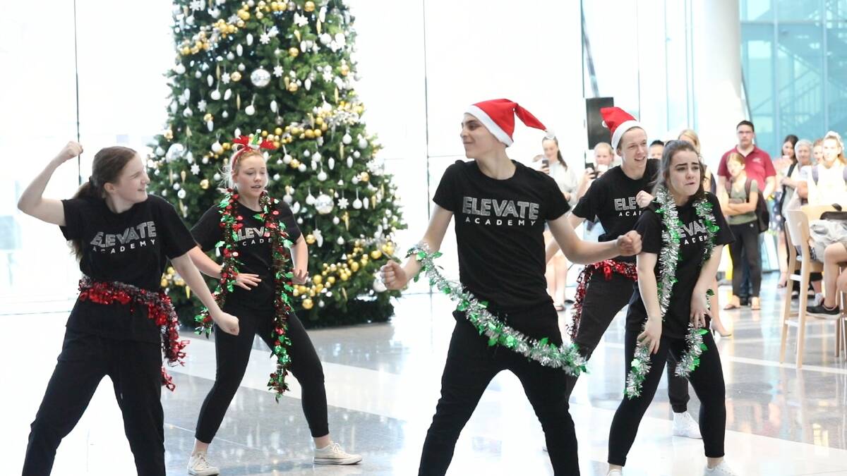 A flash mob from Elevate Academy also recently entertained passengers at Canberra Airport as part of Christmas festivities. Photo: Supplied
