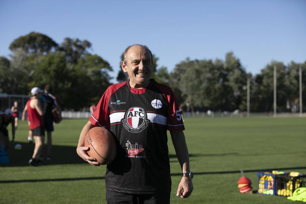 Manuel Xyrakis in footy mode. The family is long-time sponsors of the Ainslie Football Club. Photo: Supplied
