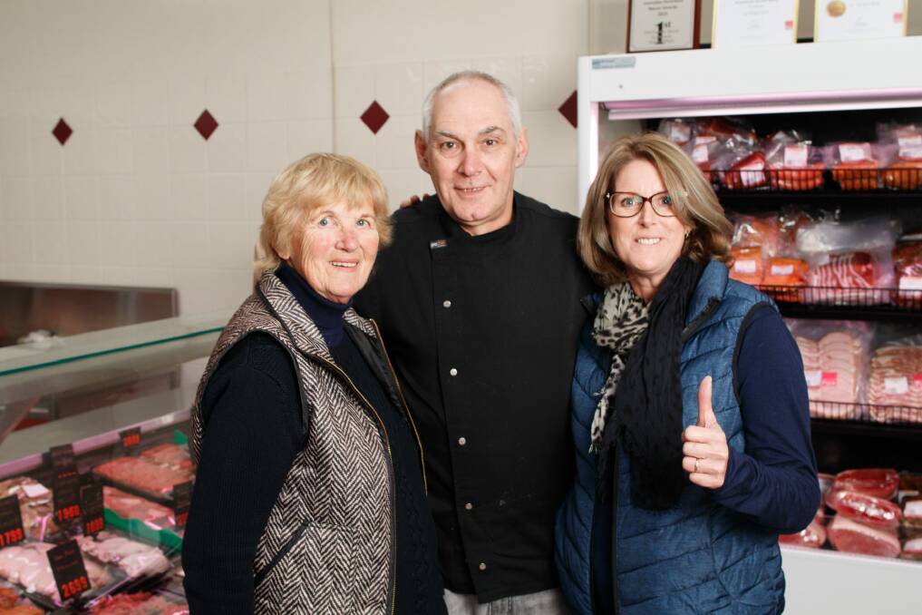 Proud nan Jennifer Sheather, and parents Allan and Donna Matthews at their butchery after Michael Matthews took out Stage 16 of the Tour de France. Photo: Sitthixay Ditthavong