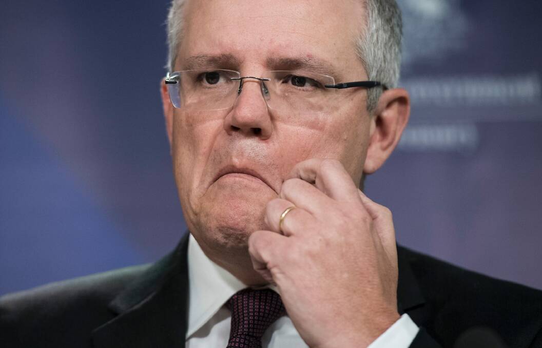 Treasurer Scott Morrison says the government will stick with the plebiscite plan it took to the election.  Photo: Nic Walker