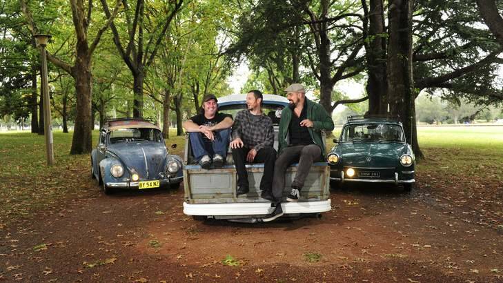 Scott Robinson of Queanbeyan, who drives a 1958 VW beetle, Scott Clements of McKellar, owner of a 1977 VW ute and Andrew Stamiris of Forrest, who drives a 1969 VW type 3 fastback, will be taking part in the VW rally to raise funds for the Canberra Hospital. Photo: Melissa Adams