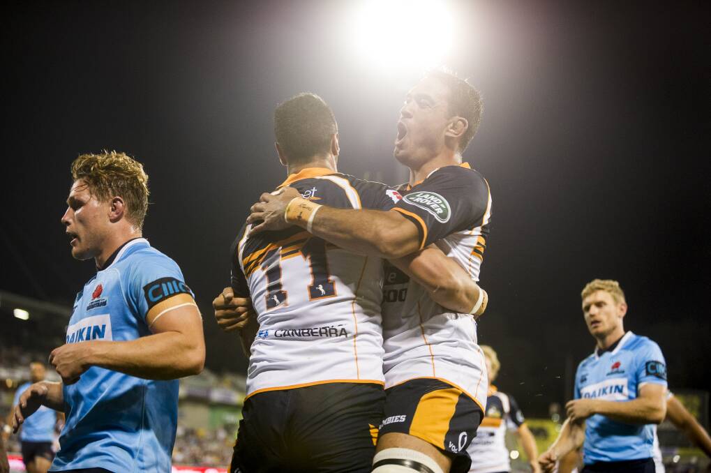 Brumbies Vs NSW Waratahs March 31 2018. Left Lock Rory Arnold celebrates with Left Wing Lausii Taliauli after he scores a try.  Photo: Dion Georgopoulos
