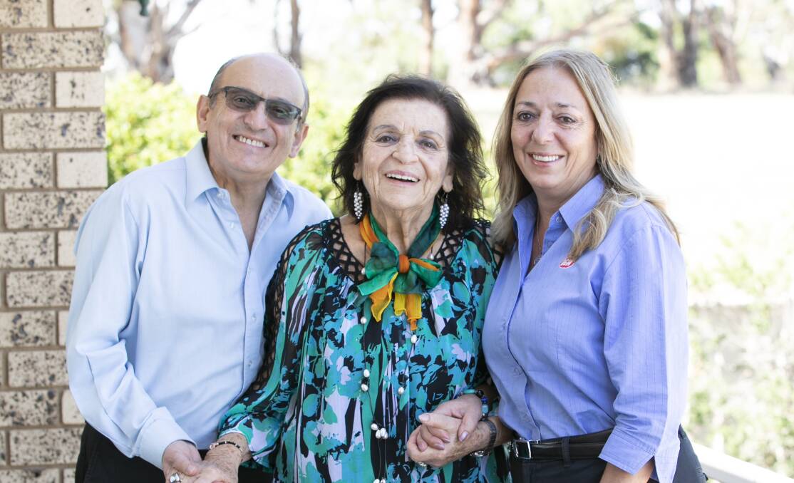 Family matriarch Alice Xyrakis (centre) with son Manuel and daughter Irene. Photo: Supplied