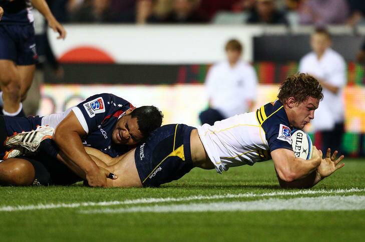 Michael Hooper of the Brumbies scores during the round eight Super Rugby match between the Brumbies and the Rebels at Canberra Stadium earlier this month. Photo: Getty Images
