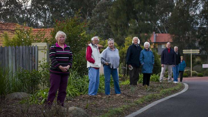 Residents of The Gardens in Nicholls, from left, Jan Banens, Ron and Joan Hancock, Les and Hilda Clement, Bob Banens, Terry Malcolm and Denise Jurgens, stand where trees once stood. Photo: Rohan Thomson