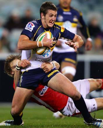 The Brumbies Ian Prior is tackled by Liam Williams of Wales. Photo: Getty Images
