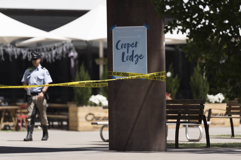 Cooper Lodge at the University of Canberra is evacuated and cordoned off by police Photo: Lawrence Atkin