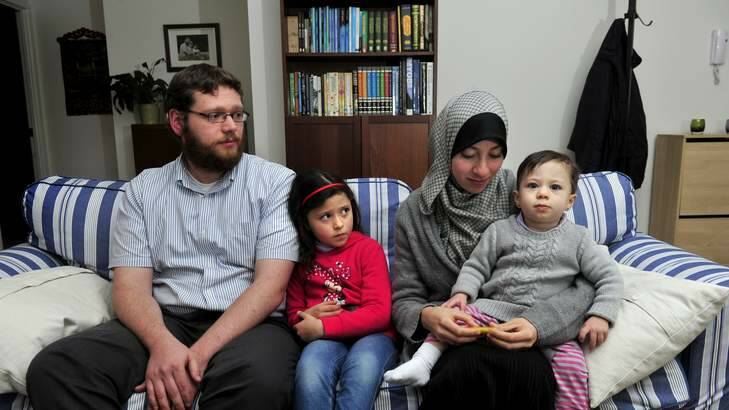 Ahmed El Zein with his  wife Eman El-Sayed and daughters Mariam, 6 and Aaisha 18 months at their home in Harrison talk about what is happening in Egypt. Photo: Melissa Adams