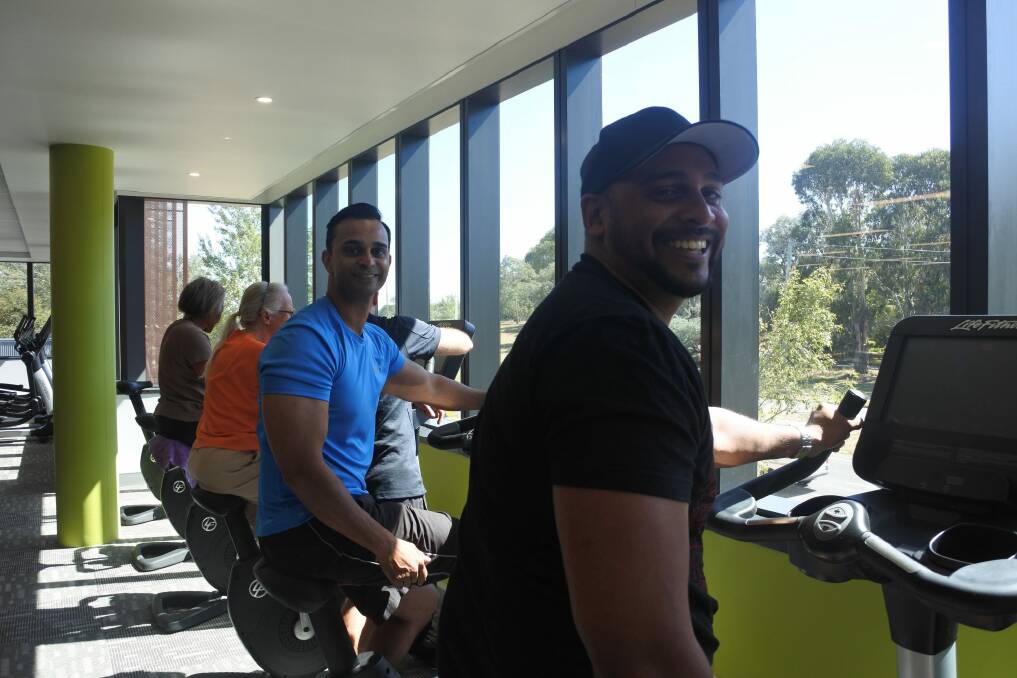 Brothers Brentyn Wilson, of Oxley, and Dareen Wilson, Gowrie, in the gym with a view at the new Southern Cross Club health and wellness building on Yamba Drive. Photo: Megan Doherty