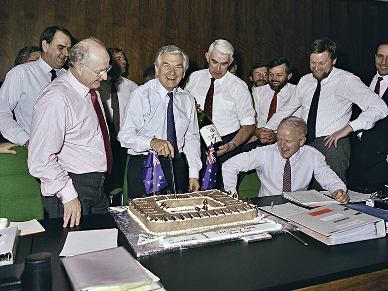 Clyde Holding, Bob Hawke, John Kerin, John Dawkins, Gareth Evans, other ministers and staff at the last Cabinet meeting in the old Cabinet Room, in 1988.  Photo: National Archives of Australia