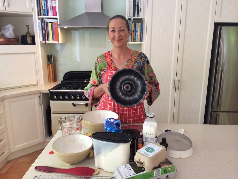 Canberra MP Gai Brodtmann in the kitchen on Friday baking her Shine Dome cake to help new mums coping with anxiety and depression. Photo: Supplied