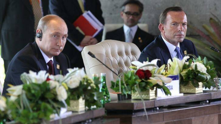 Vladimir Putin and Prime Minister Tony Abbott during the APEC Economic Leaders Meeting. Photo: Alex Ellinghausen