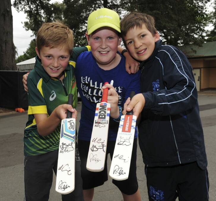Young fans Fin McCrae, 11, of Holder, Ethan Kirk, 12, of Kambah, and Harry Austin, 11, of Fisher. Photo: Graham Tidy