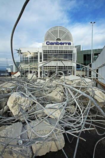 The old Canberra airport terminal under demolition. Photo: Ginette Snow