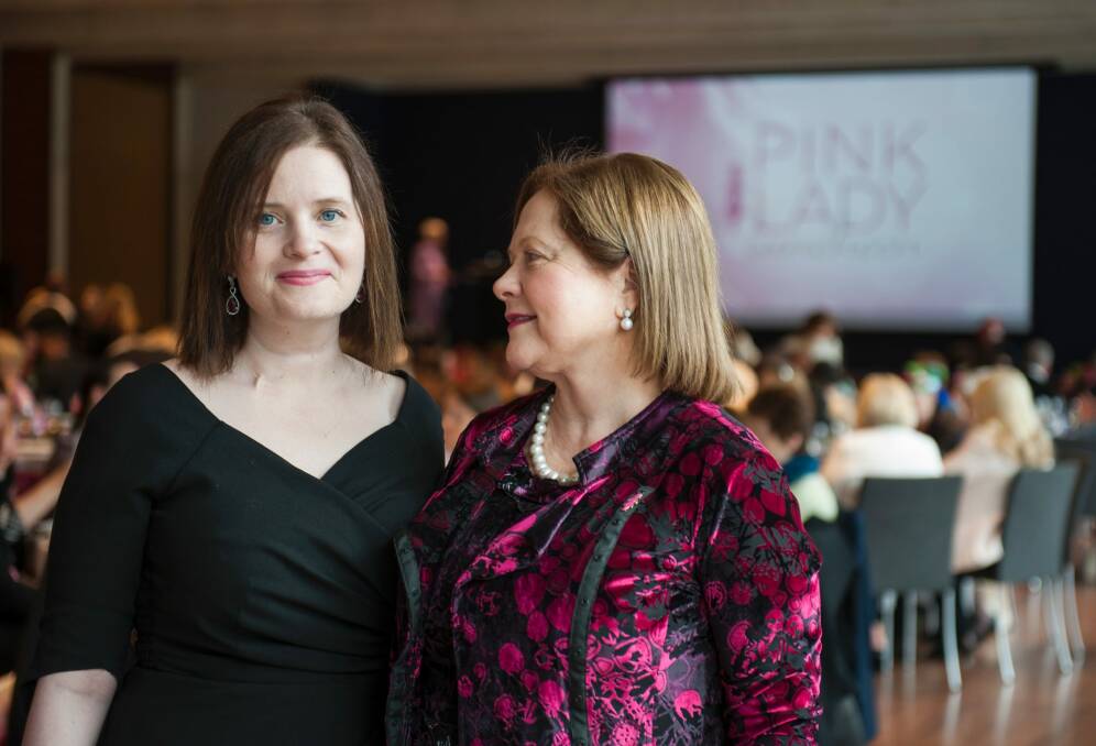 Caitlin Moorhouse, who has bowel cancer, with her mother and CEO of Breast Cancer Network Australia, Christine Nolan, at the Pink Lady luncheon at the National Gallery on Wednesday. Photo: Elesa Kurtz