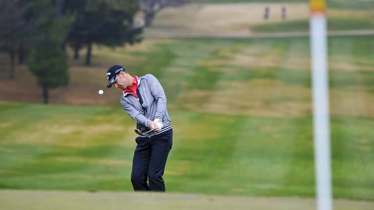 Brendan Jones gets in a bit of practice at the Royal Canberra course. Photo: Graham Tidy