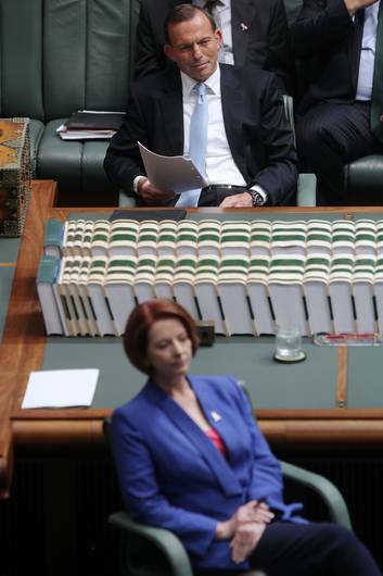 Not so out of touch . . . Tony Abbott and Julia Gillard. Photo: Alex Ellinghausen