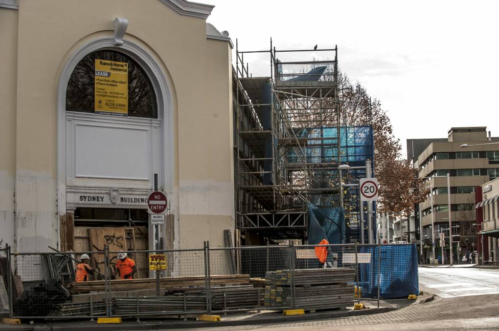 The scaffolding comes down on the Sydney Building in Civic. Photo: Karleen Minney