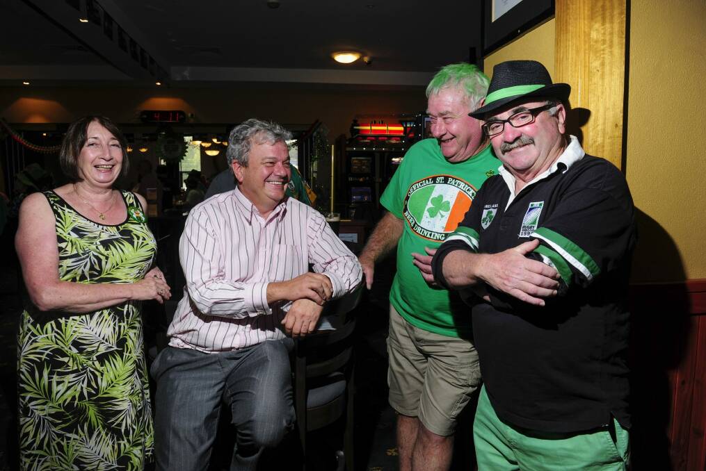 Canberra Irish Club members from left, Mary Keary of Nicholls, president Peter Whelan of Duffy, Joe Lodding of Weston and Sean Cahill of Monash at the club on St Patrick's Day. Photo: Melissa Adams