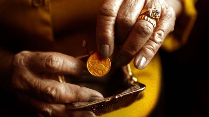 dollar pic  generic.  elderly.  pensioner, gst, tax, savings etc, purse. Photo: Greg Newington