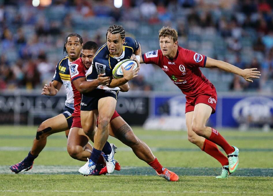 Brumbies five-eighth Matt Toomua takes on the line in the 47-3 win against the Queensland Reds in round one. The Brumbies face the Reds in Brisbane on Saturday night. Photo: Getty Images
