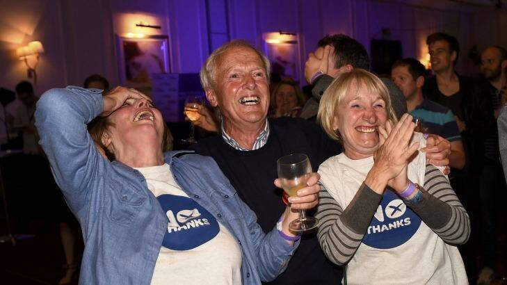 United we stand: Supporters from the "No" Campaign react to a declaration in their favour, at the Better Together Campaign headquarters in Glasgow.