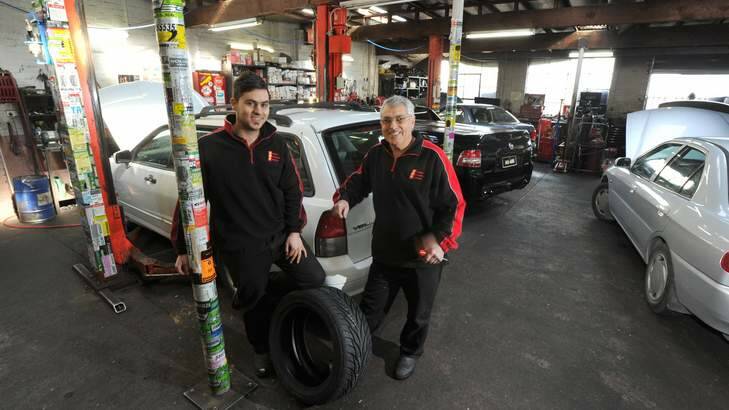 Braddon Mechanical Repairs on Lonsdale Street. Owner, Angelo Rodriguez with his son, Daniel. Photo: Graham Tidy