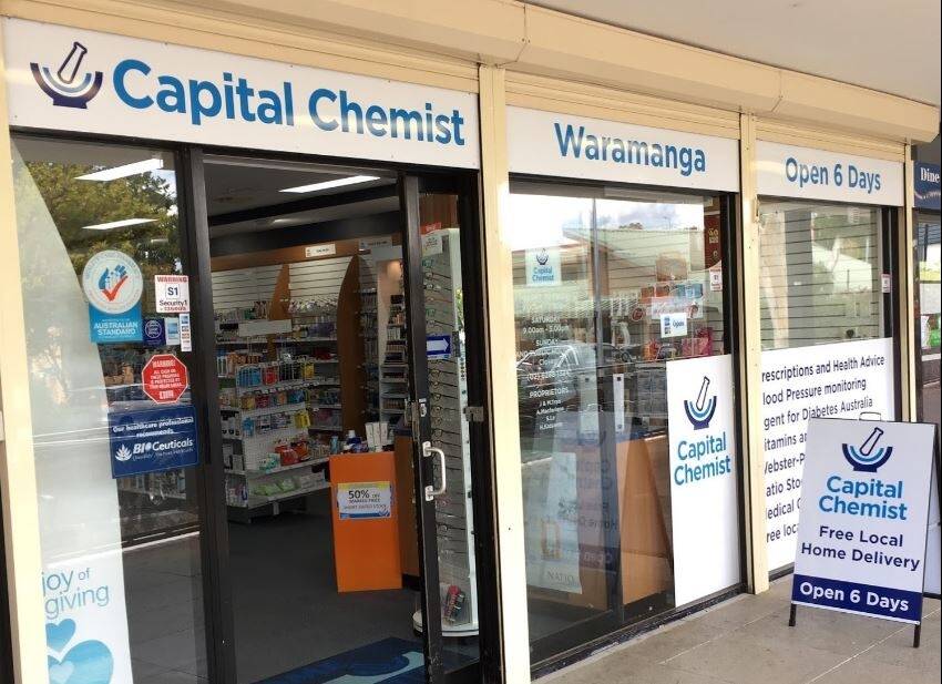 ACT policing investigate daylight robbery at Capital Chemist  Photo: Han Nguyen