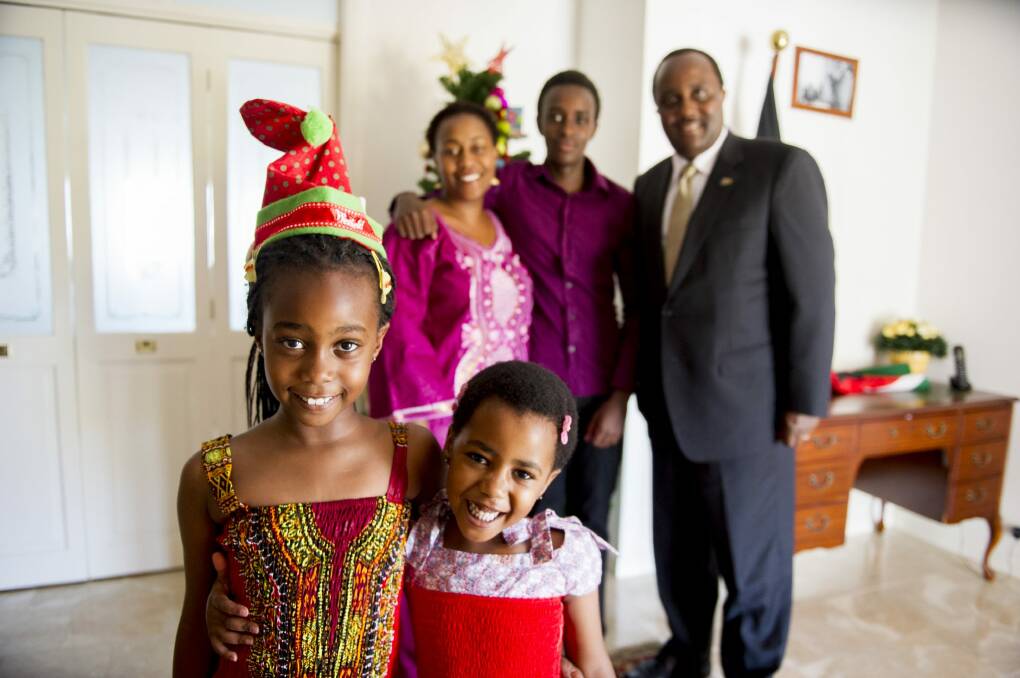 Kenyan high commissioner to Australia Isaiya Kabira will spend his first Christmas in Australia with his wife, Betty, and children, William, 15, Abby-Ntaliwa (left), 8, and Natali Kabira, 5.
Photo Jay Cronan Photo: Jay Cronan