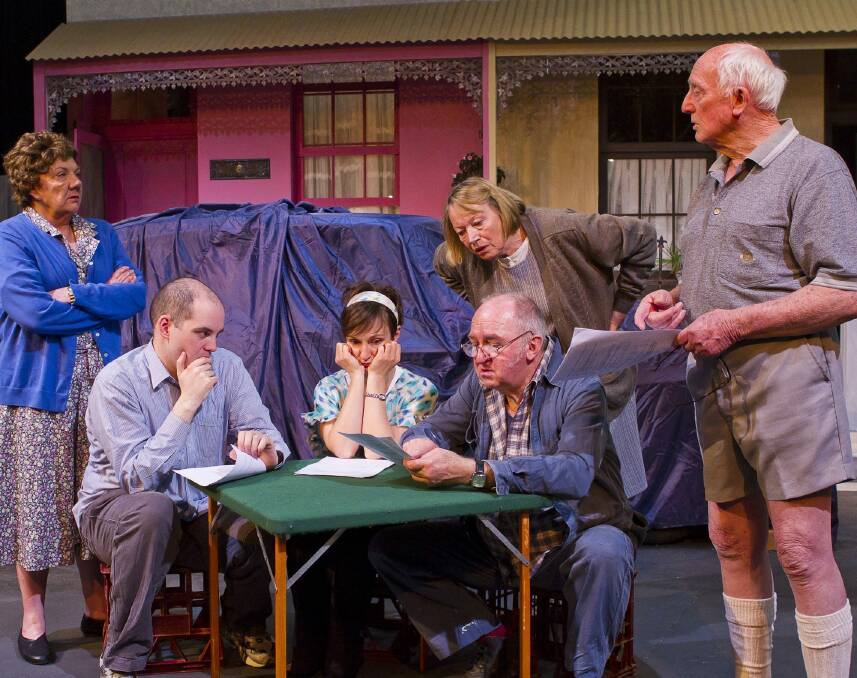 Judi Crane as Janette, Sam Hannan-Morrow  (seated) as Nick, Helen McFarlane (seated) as April, Wayne Shepherd (seated) as Claude, Trish Kelly (standiing) as Rosie, Graham Robertson (standing) as Jack  in <i>The Pig Iron People</i>, for which Chris Ellyard did lighting design. Photo: Cliff Spong