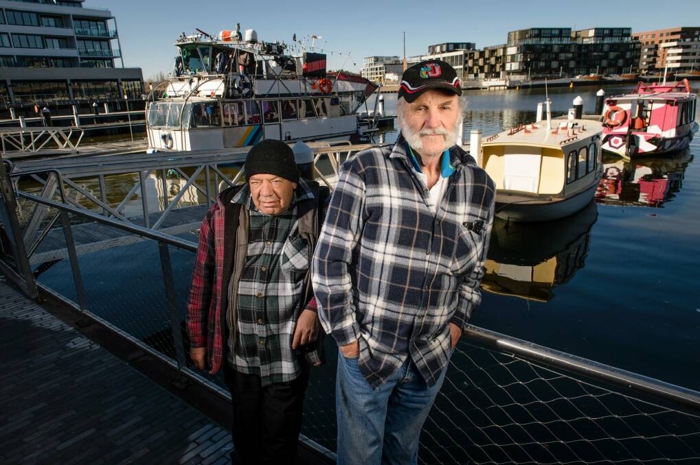 Boat owners John Arganese (left) and Jim Paterson (right) say issues at Kingston Harbour need to be sorted. Photo: Sitthixay Ditthavong
