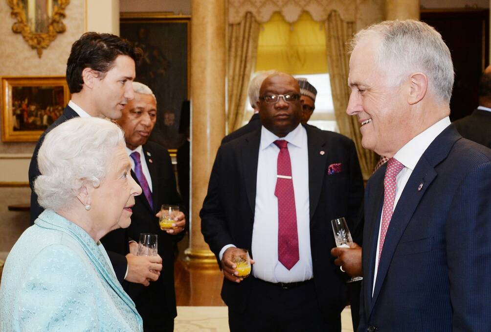 Strong ties: The Queen talking to Prime Minister Malcolm Turnbull at a reception during the Commonwealth Heads of State Summit in Malta in 2015. Photo: Getty Images
