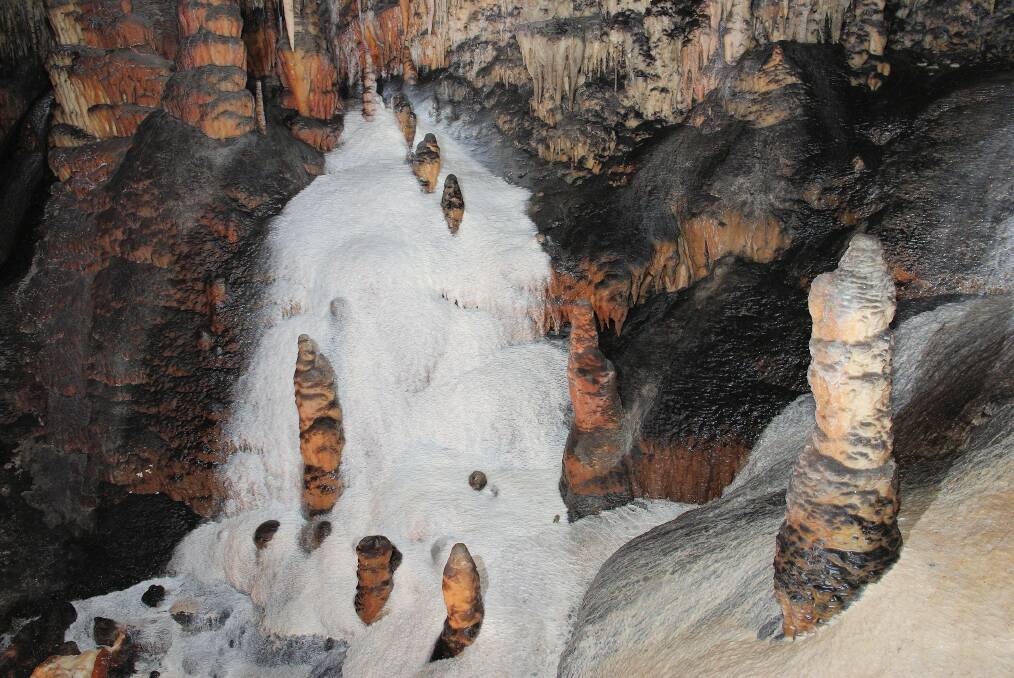 Flowstone resembling ice cream or snow in the Jersey Cave, one of several snow caves at Yarrangobilly Caves. Photo: John Brush
