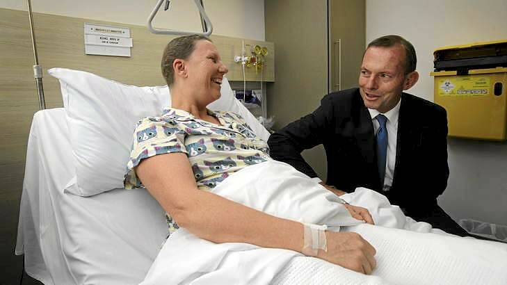 New order: Tony Abbott, with breast cancer patient Hilary King, announces funding for chemotherapy infusion drugs at The Mater. Photo: Fiona Morris