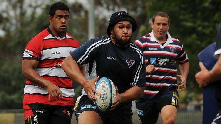 Brumbies players Scott Sio, Siliva Siliva and Ruan Smith train in their ACT club colours. Photo: Colleen Petch