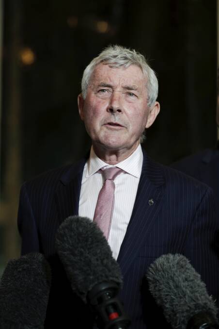 Bernard Collaery addresses the media during a press conference on the East Timor spy scandal, at Parliament House in Canberra in June. Photo: Alex Ellighausen