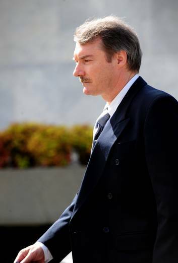 Letter bomber Colin Dunstan leaves the Supreme Court in Canberra, 2010. He is accusing Comcare of defying a court order and withholding cash that is rightfully his. Photo: Karleen Minney