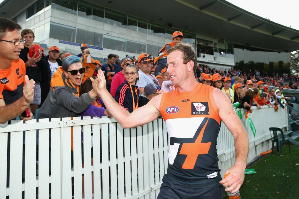 CANBERRA, AUSTRALIA - APRIL 17: Steve Johnson of the Giants thanks fans after winning the round four AFL match between the Greater Western Sydney Giants and the Port Adelaide Power at Star Track Oval on April 17, 2016 in Canberra, Australia.  (Photo by Cameron Spencer/Getty Images) Photo: Getty Images